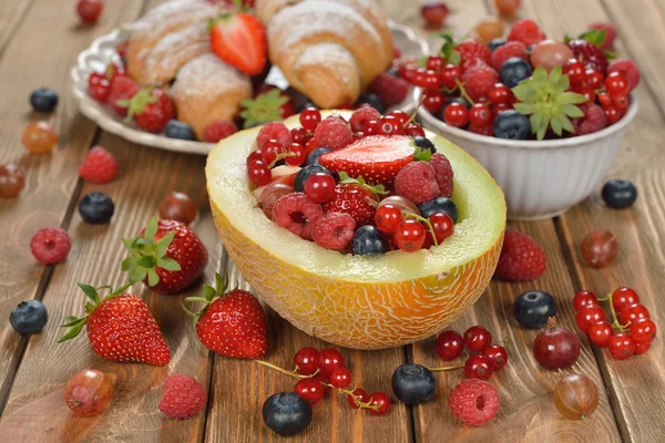 Fruit salad in melon — Stock Photo, Image