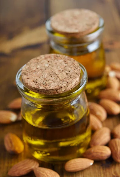 Organic Raw Almond Oil Brown Background — Stock Photo, Image