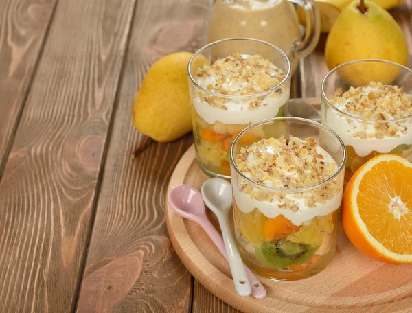 Fruit salad with whipped cream — Stock Photo, Image