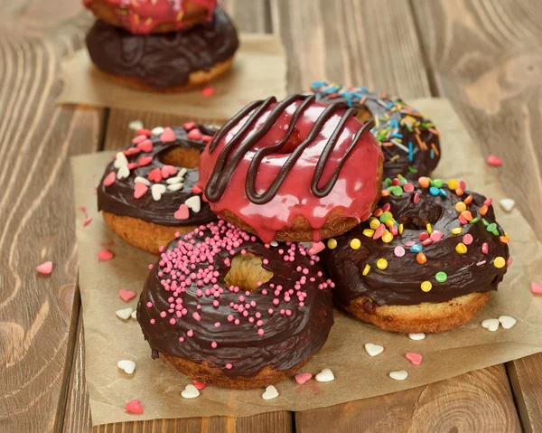 Donuts with chocolate frosting — Stock Photo, Image