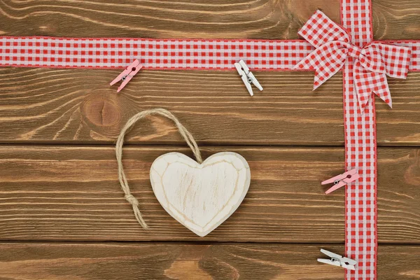 Heart and red ribbon Stock Image