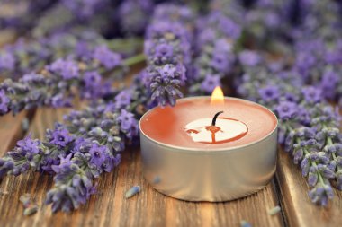 Burning candle with lavender