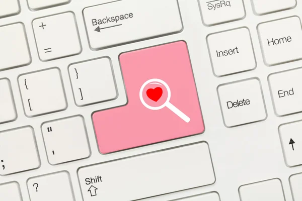 White conceptual keyboard - Pink key with find Love symbol — Stock Photo, Image