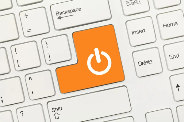 白色的概念键盘-橙色键和权力象征 — 图库照片