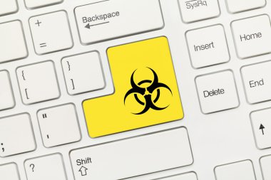 Beyaz kavramsal klavye - biohazard simgesi olan sarı tuş