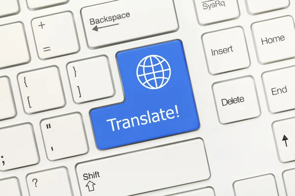 Weiße konzeptionelle Tastatur - translate (blaue Taste mit Erdsymbol) — Stockfoto