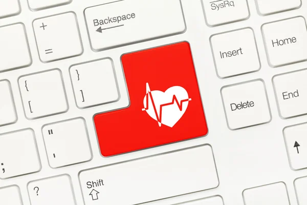 Witte conceptuele toetsenbord - rode toets met symbool van de cardiologie — Stockfoto