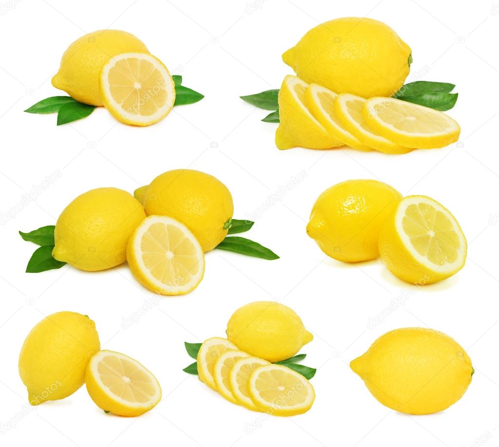 Set whole and sliced lemons with green leaves (isolated)