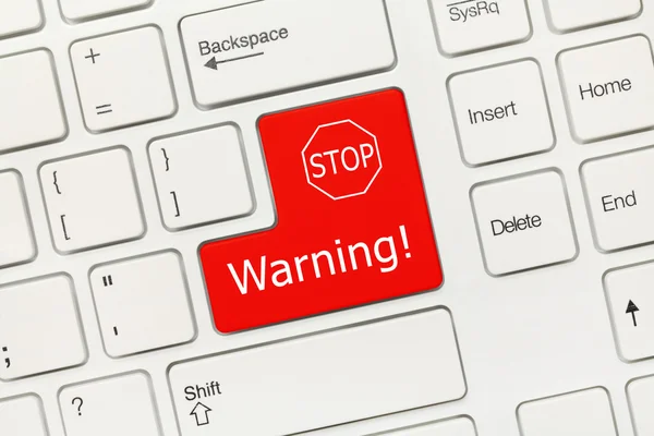 Białym klawiatury koncepcyjne - ostrzeżenie (czerwony przycisk stop znak) — Zdjęcie stockowe