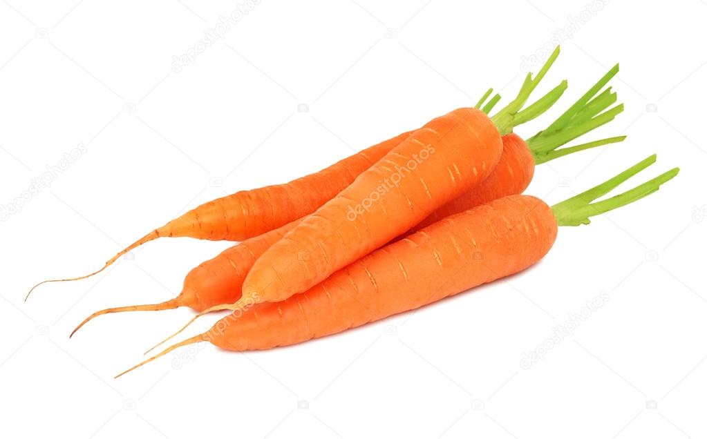 Stack of ripe carrots with cutted tops (isolated)