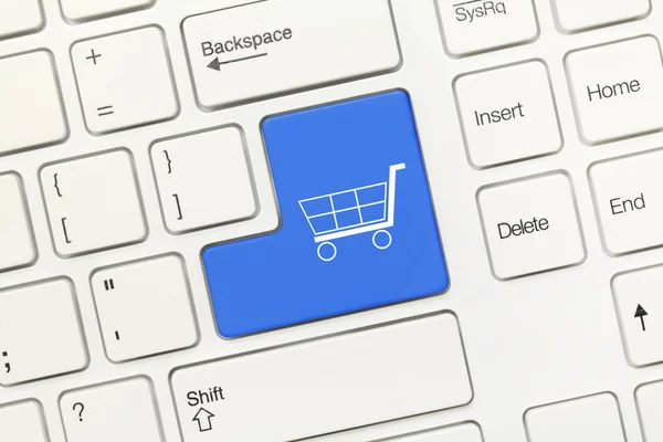 White conceptual keyboard - Blue key with shopping cart symbol — Stok fotoğraf