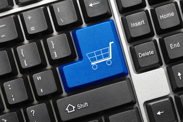 Konceptuella tangentbord - blå knappen med shopping cart symbol — Stockfoto