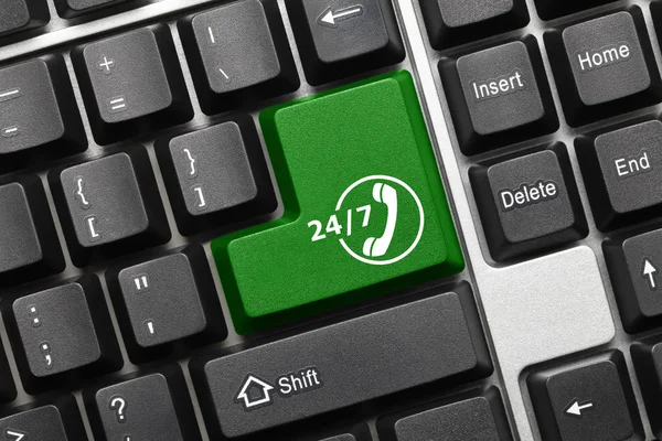 Conceptual keyboard - Green key with around the clock support sy — Stock Photo, Image