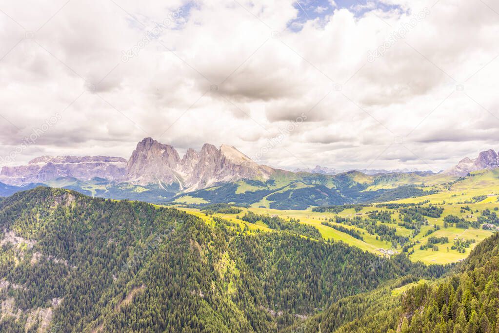 Italy, Alpe di Siusi, Seiser Alm with Sassolungo Langkofel Dolomite, a view of a mountain