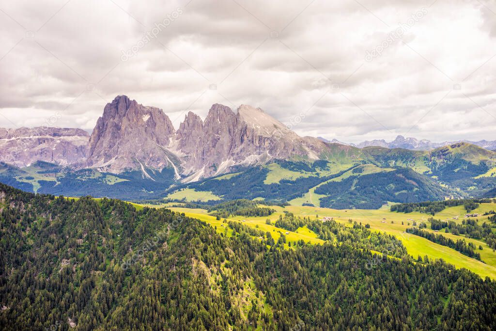 Italy, Alpe di Siusi, Seiser Alm with Sassolungo Langkofel Dolomite, a view of a mountain