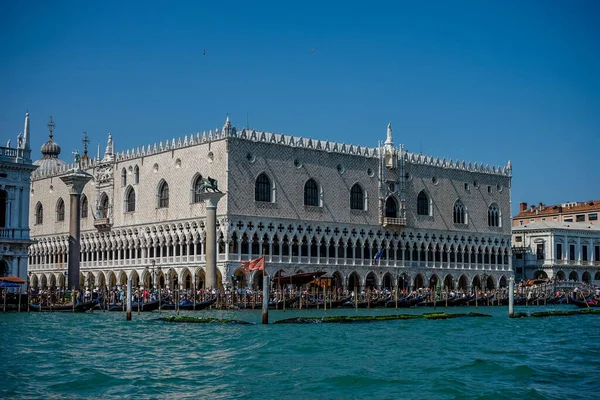 Europe, Italy, Venice, Doge\'s Palace, a large white building surrounded by water with Doge\'s Palace in the background