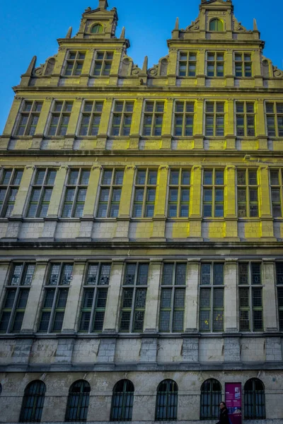 Goldent sunlight falling on a building with gable in Ghent, Belgium, Europe