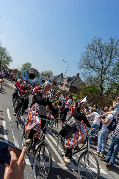 stock image Netherlands,Sassenheim-21 April 2018:Bulbflower Parade 2018,Bloemencorso BollenStreek,festive spectacle,vehicles decorated with flowers, face of spring, National Dutch flower parade,trumpet on cycle