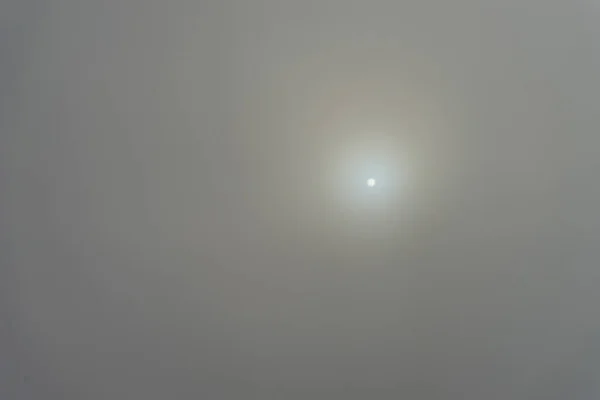 View of clouds from airplane window, LOW ANGLE VIEW OF MOON IN SKY