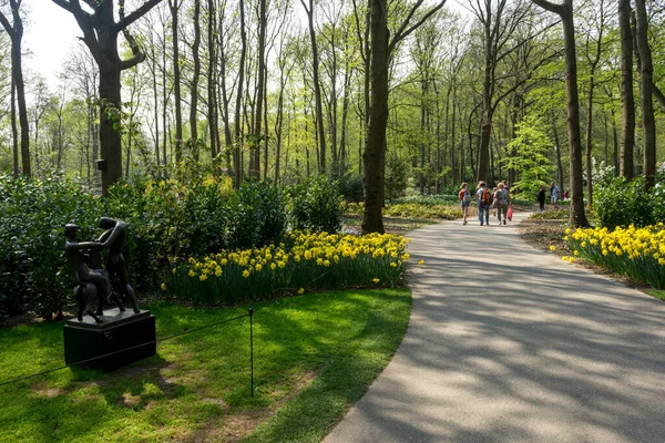 Netherlands Lisse Europe People Walking Footpath Amidst Trees — 图库照片