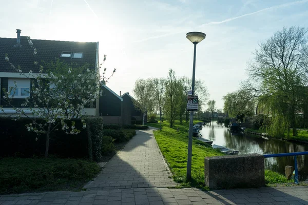 Netherlands,Wetlands,Maarken,Europe, a bench in front of a house — Stock Image Netherlands Wetlands Maarken Europe Bench Front House Stock Picture