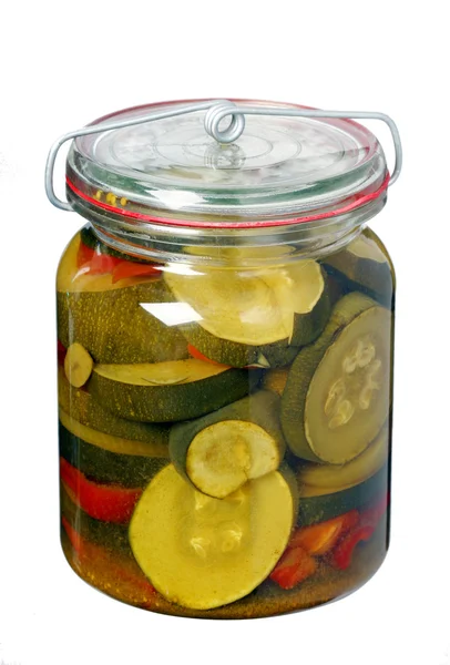 Glass jar with pickled zucchini — Stock Photo, Image