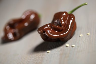 habanero chocolate on wooden background clipart