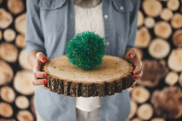 Girl holding a tree ring — Stock Photo, Image