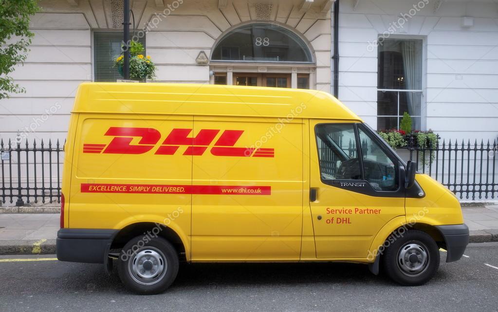 London, England - April 30, 2015: A DHL van parked in a street in Central London. DHL is part of Deutsche Post DHL Group, a postal and logistics company operating in over two hundred countries.