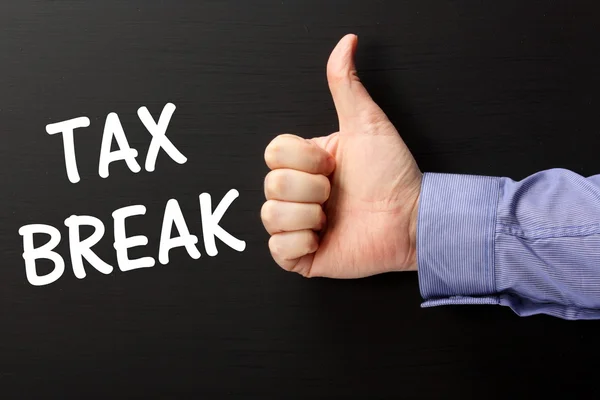 Thumbs Up for a Tax Break — Fotografie, imagine de stoc