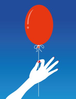 Kırmızı bir balon holding