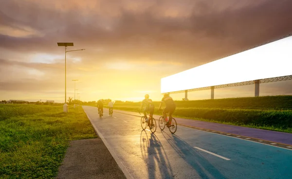 Sports Man Ride Bicycles Road Evening Blank Advertising Billboard Sunset — Stock Photo, Image