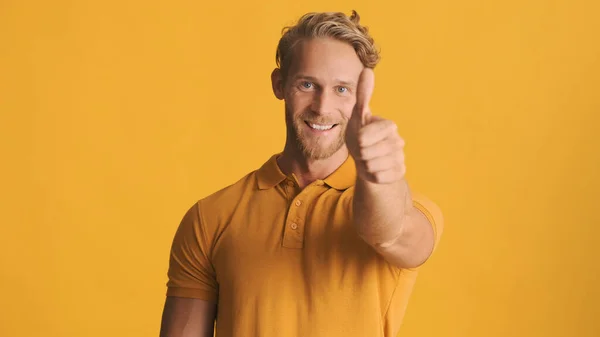 Attractive Blond Bearded Man Showing Thumb Looking Happy Camera Yellow — Stock Photo, Image