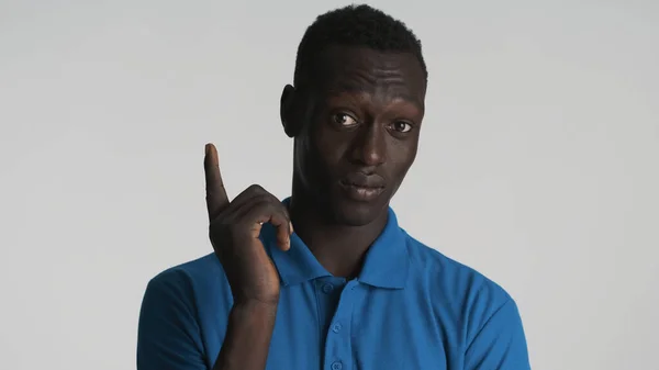 African American Guy Dressed Casual Wear Keeping Index Finger Showing — Stock Photo, Image