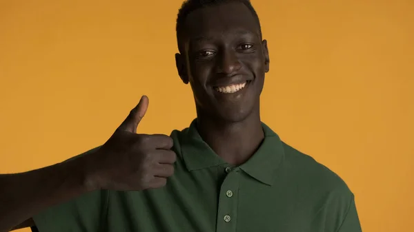 Attractive Smiling African American Guy Looking Happy Keeping Thumb Camera — Stock Photo, Image