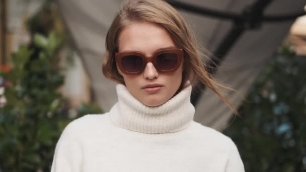 Gorgeous Stylish Girl Sunglasses Dressed White Sweater Looking Confident Posing — Stock Video