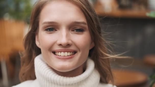 Portrait Pretty Smiling Girl Dressed Cozy White Sweater Looking Happy — Stock Video