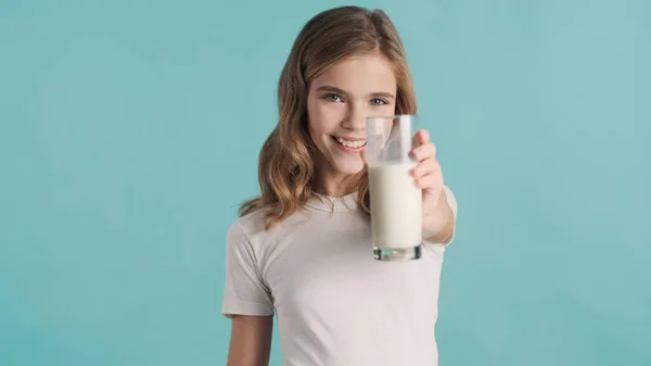 Attractive Smiling Blond Teenage Girl Wavy Hair Offering Glass Milk — 图库照片