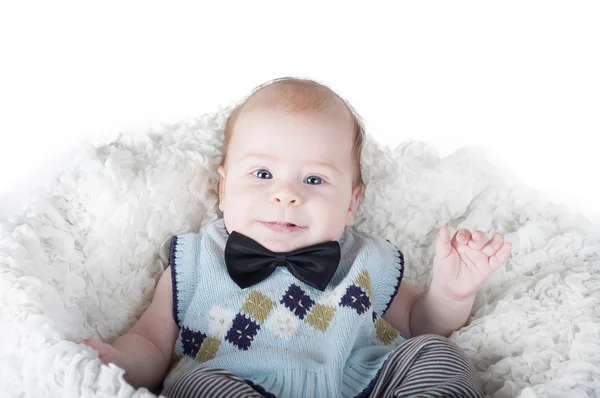 Bebê-menino de colete no fundo branco — Fotografia de Stock