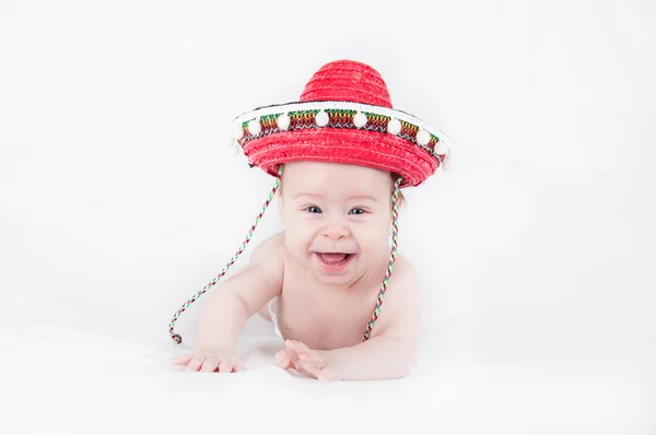 Niño alegre con sombrero y maracas sobre fondo blanco — Foto de Stock