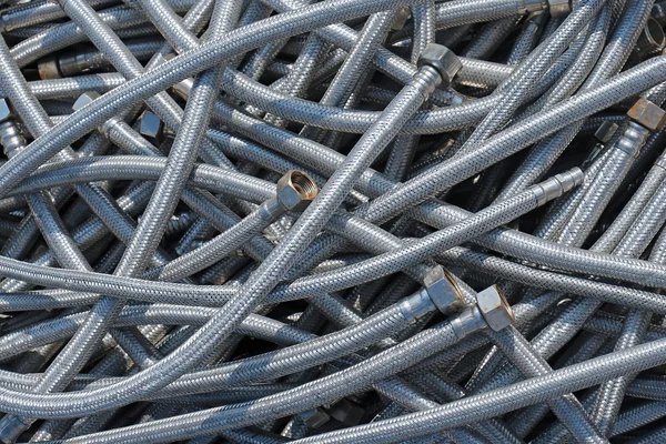 Metal hoses pile — Stock Photo, Image