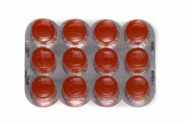 Orange Flavour Sore Throat Lozenges Medicine Silver Blister White Background — Stock Photo, Image