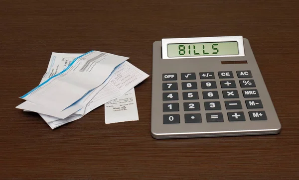 Home Utilities Other Bills Pile Calculating Large Electronic Calculator — Stock Photo, Image