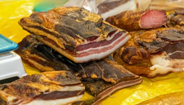 Organic cured bacon and other dry meat sold on market