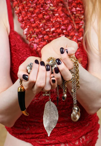 Jewelry pile hands — Stock Photo, Image