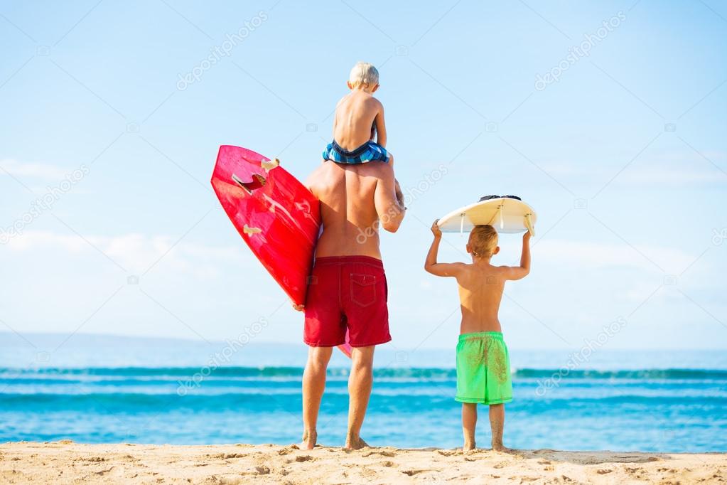 Father and Sons Going Surfing