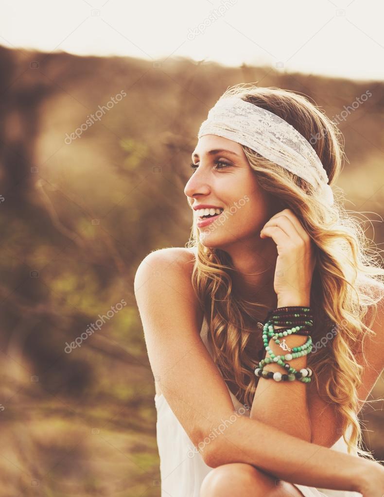 Fashion Portrait of Beautiful Young Woman Backlit at Sunset