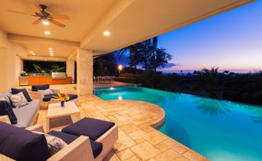 Luxury Home with Pool at Sunset  clipart