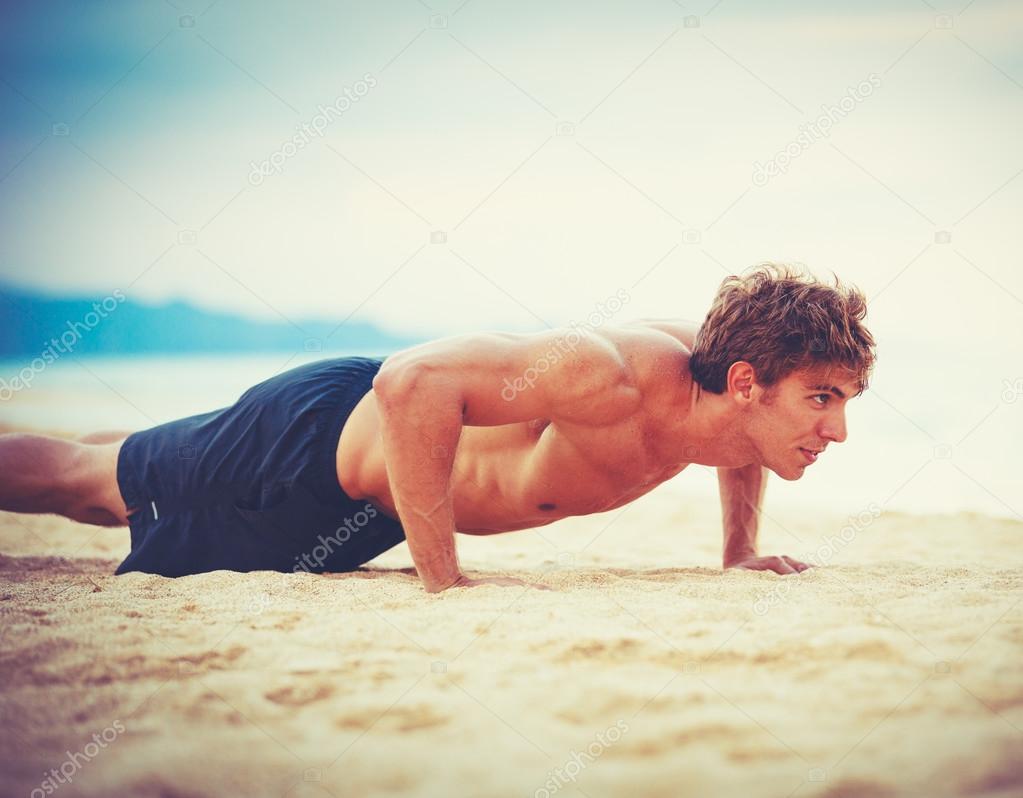 Male Athlete Exercising Doing Push-Ups