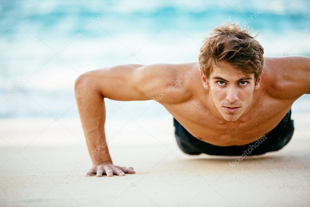 Male Athlete Exercising Doing Push-Ups